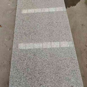 襄阳芝麻白光面毛板